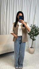 Gilet sans manches à boutons pression