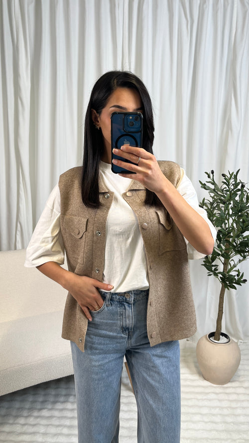 Gilet sans manches à boutons pression